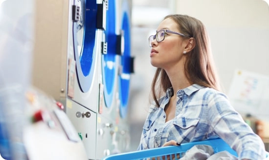 woman_looks_at_washer