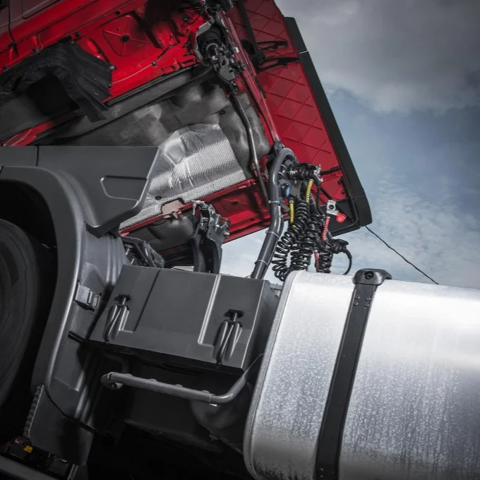 Heavy-duty truck fuel system under open hood