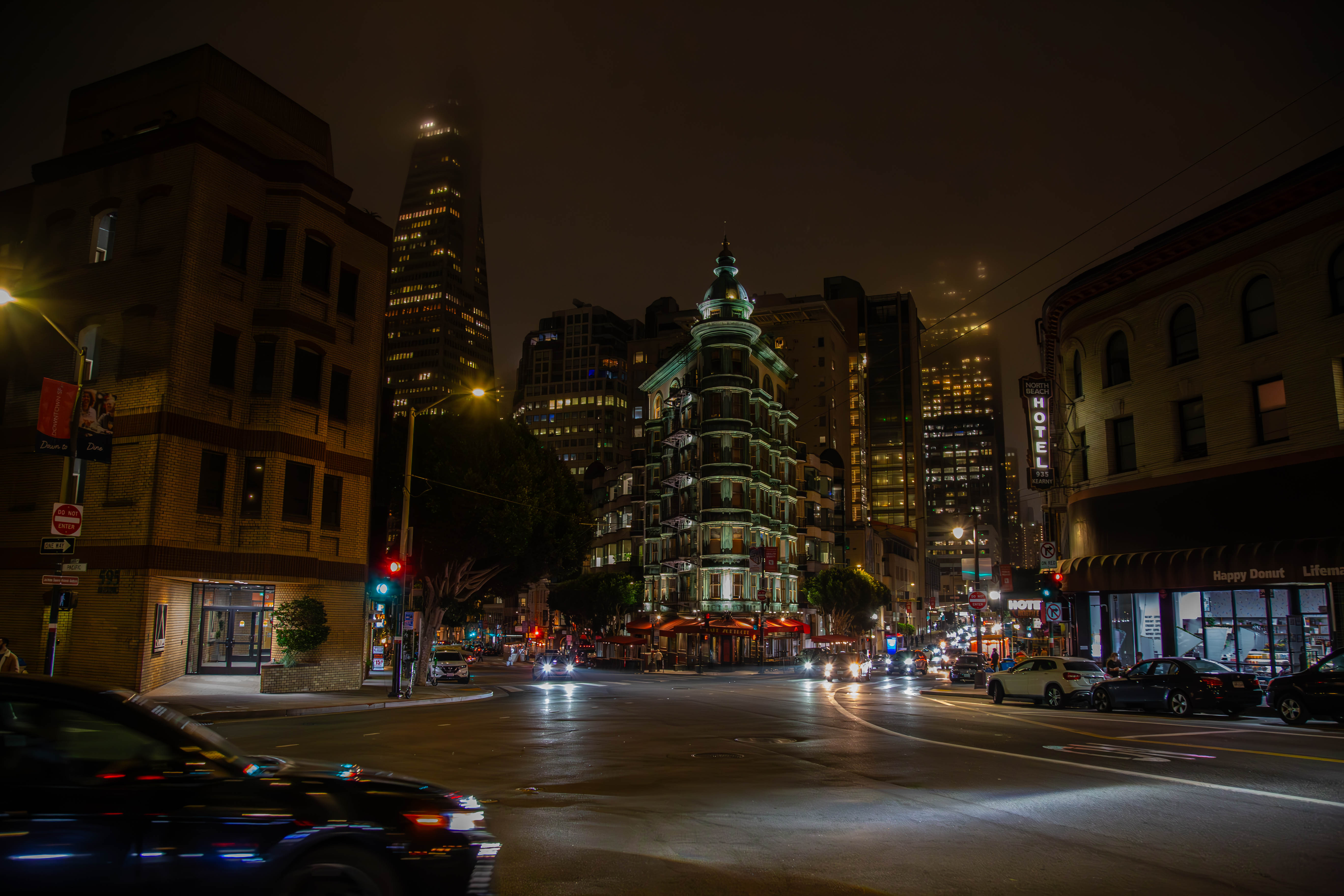 City Nighttime A nighttime view of San Francisco's Transamerica Pyramid and illuminated streets, with vibrant urban activity.San Francisco, USA