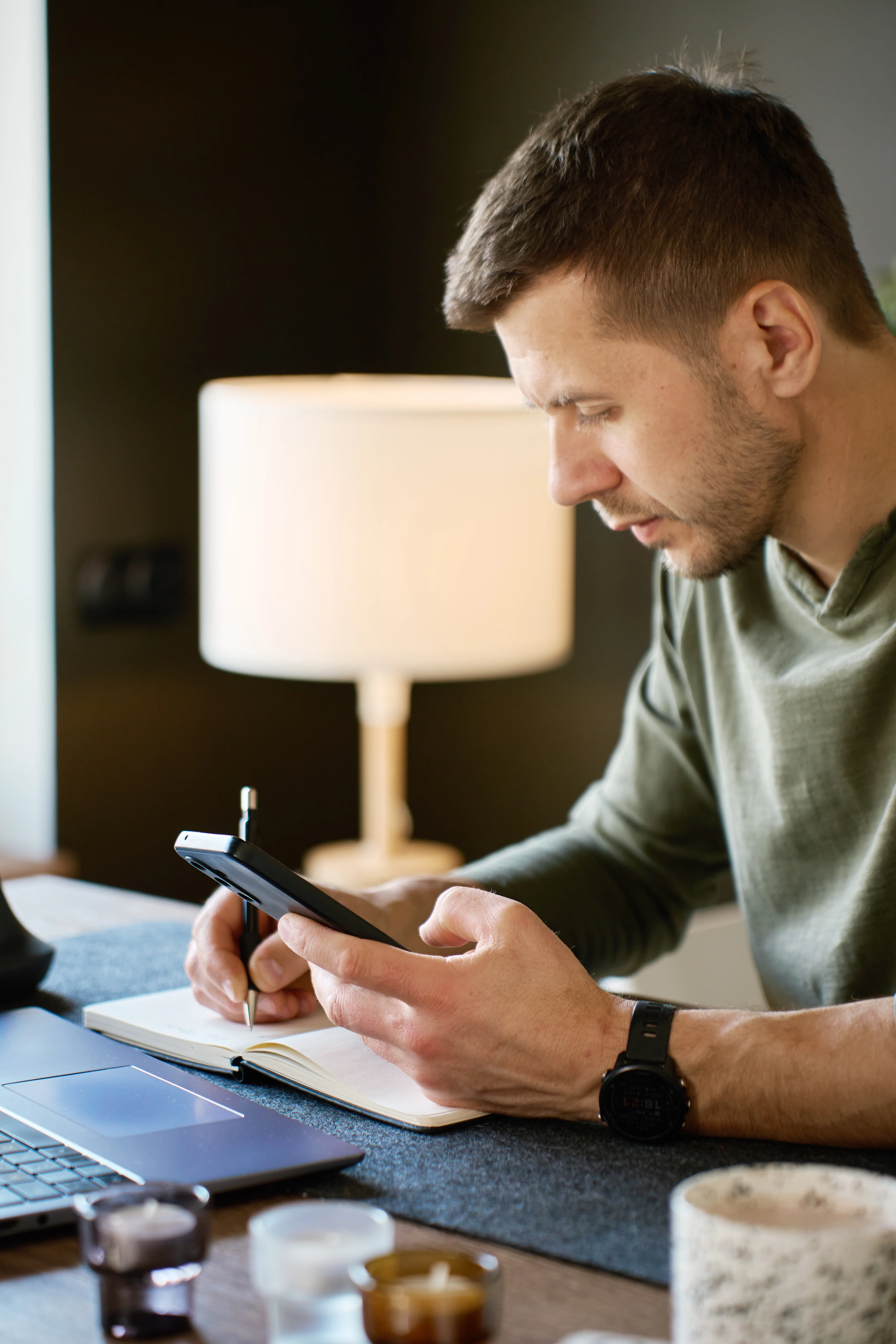 man checking smartphone
